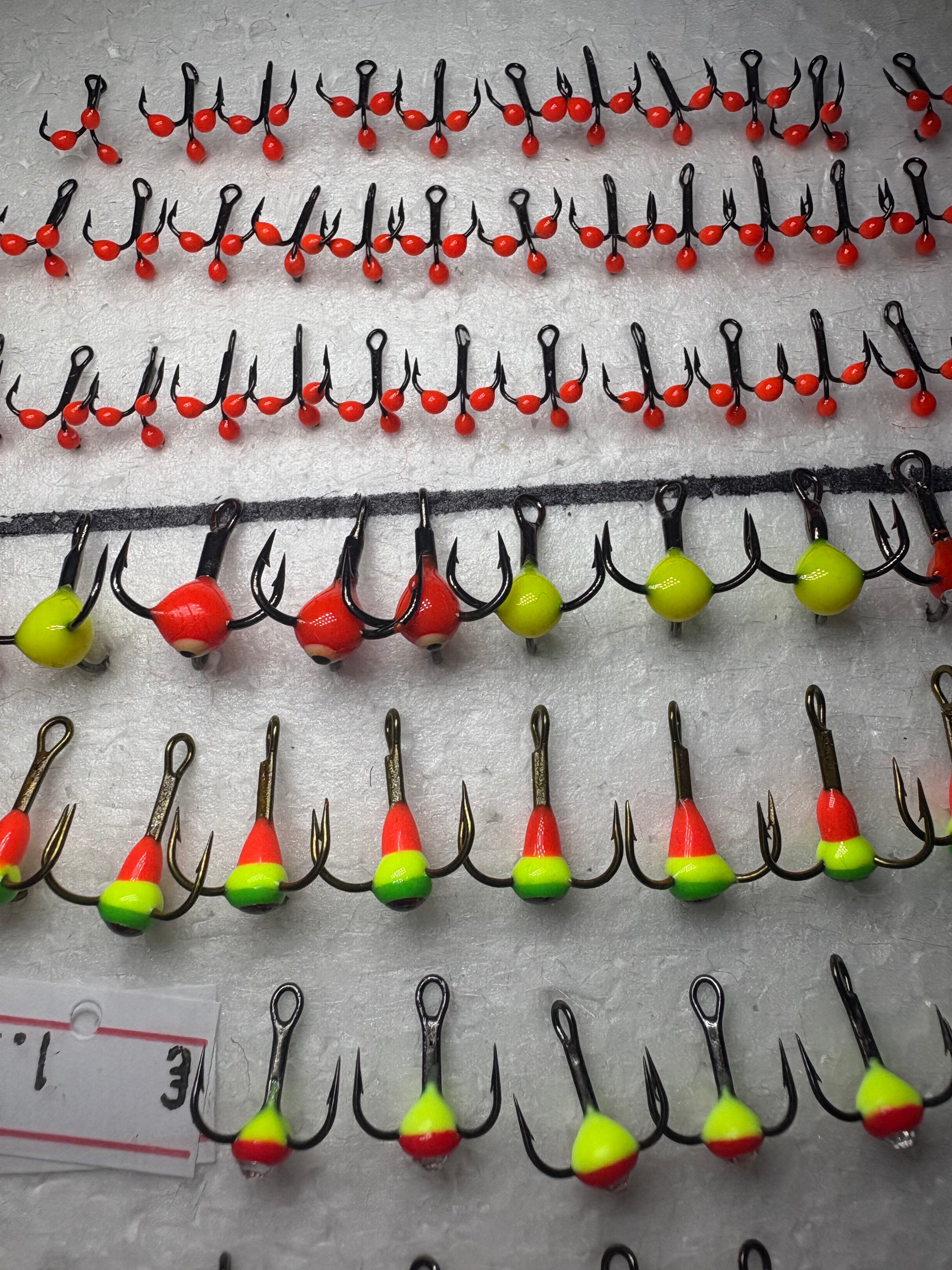 Three-pronged hook with a ball